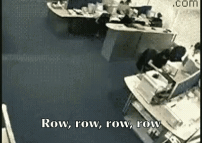 Man In Baseball Cap Standing In Front Of Door GIF