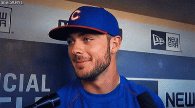 Man In Baseball Cap Talking Into Microphone GIF