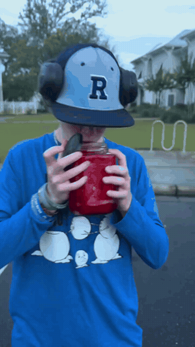 Man In Baseball Cap With Letter R GIF
