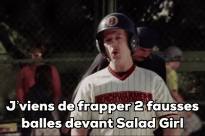 Man In Baseball Helmet And Jersey Standing In Front Of A Fence GIF