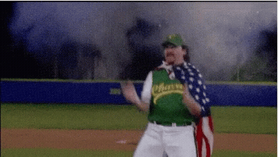 Man In Baseball Uniform Holding American Flag GIF