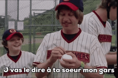 Man In Baseball Uniform Holding Ball Says J'as Le Dire A Ta Soeur Mon Gars GIF