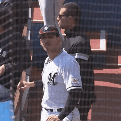 Man In Baseball Uniform With Letter M GIF