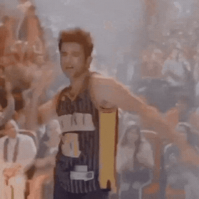 Man In Basketball Jersey Number 31 Standing Before Crowd GIF