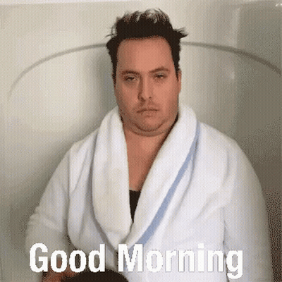 Man In Bathrobe Saying Good Morning In Bathtub GIF