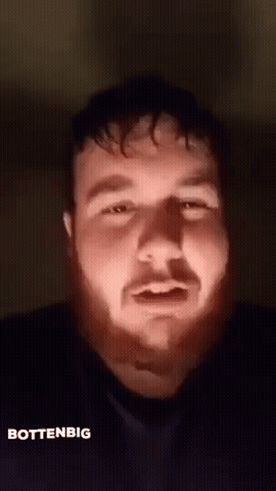 Man In Bathrobe Sitting In Bathtub Holding Coffee GIF