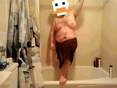 Man In Bathtub With Duck Head On Head GIF