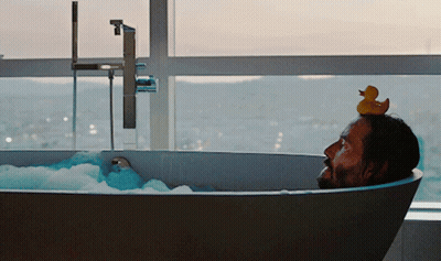 Man In Bathtub With Rubber Duck On Head GIF