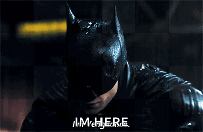 Man In Batman Costume Saying I'm Here GIF