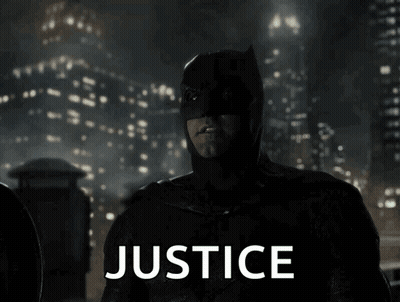 Man In Batman Costume Saying Justice GIF