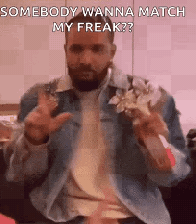 Man In Batman Costume Sitting In Rain GIF