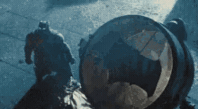 Man In Batman Costume Walking GIF