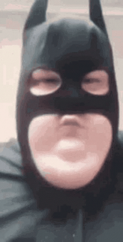 Man In Batman Mask Making Funny Face GIF