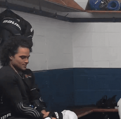 Man In Bauer Jersey In Locker Room GIF