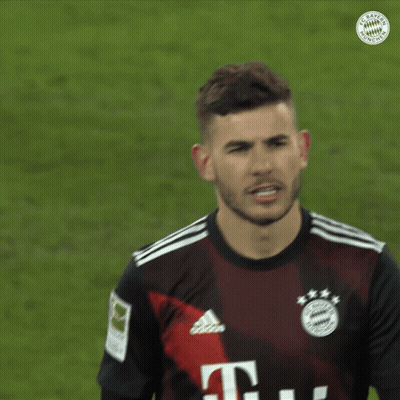 Man In Bayern Munich Jersey Looking At Camera GIF