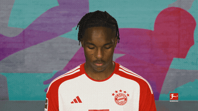 Man in Bayern Munich Jersey Looking Down