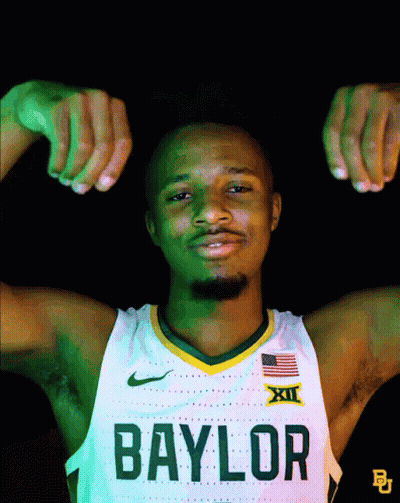 Man In Baylor Jersey Flexing Muscles GIF