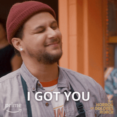 Man In Beanie And Apron Smiling Says I Got You GIF