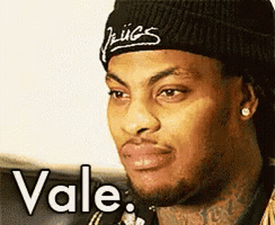 Man In Beanie And Bandana Saying Vale GIF