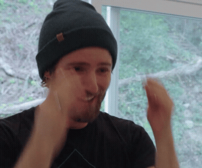 Man In Beanie And Black Shirt Making A Face GIF