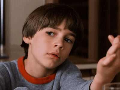 Man In Beanie And Black T-Shirt Saying His Head GIF