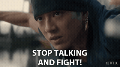 Man In Beanie And Earrings Says Stop Talking And Fight GIF