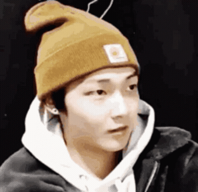 Man In Beanie And Hoodie Making Funny Face GIF