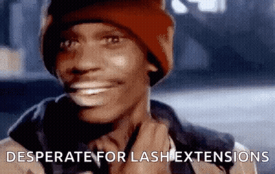 Man In Beanie And Jacket Desperate For Lash Extensions GIF