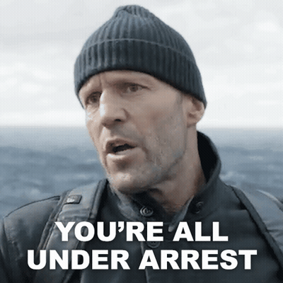 Man In Beanie And Jacket Talking GIF