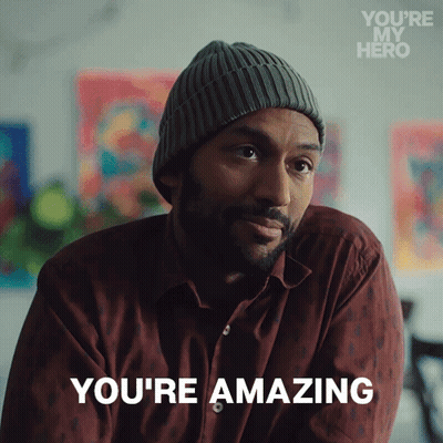 Man In Beanie And Maroon Shirt Says You're Amazing GIF