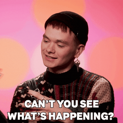 Man In Beanie And Sweater Says Can't You See What's Happening GIF