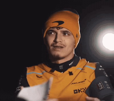 Man In Beanie Holding Paper GIF
