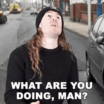 Man In Beanie What Are You Doing Man GIF
