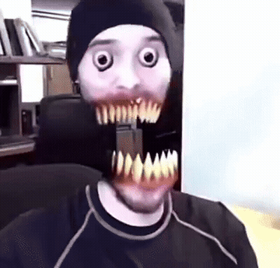 Man In Beanie With Monster Mouth Mask GIF