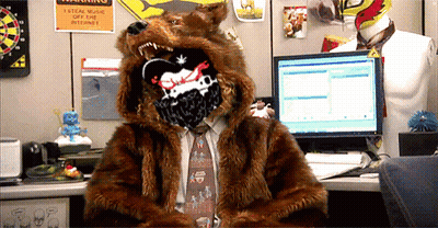 Man In Bear Costume At Desk With Computer GIF