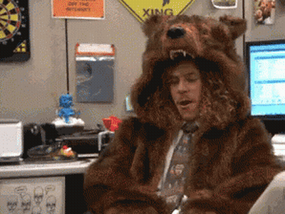 Man In Bear Costume Sitting At Computer GIF