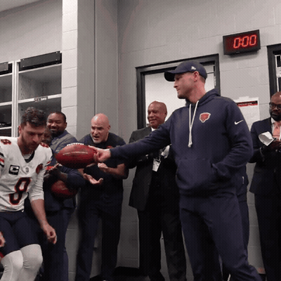 Man In Bear Sweatshirt Holding Football At 0:00 Clock GIF