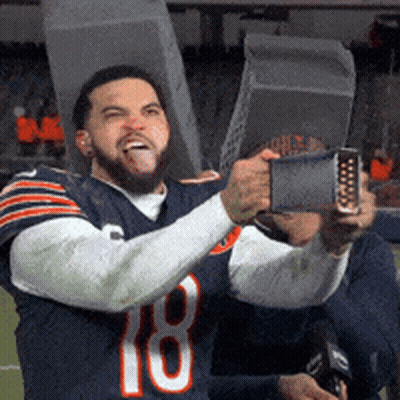 Man In Bears Jersey Taking Selfie GIF