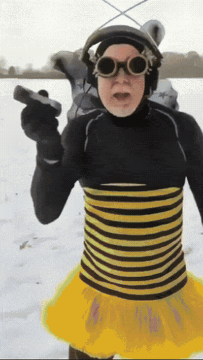 Man In Bee Costume Holding Gun GIF
