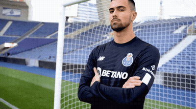 Man In Betano Jersey On Soccer Field GIF