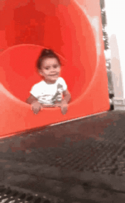 Man In Bikini Standing In Front Of House With Haaayyy Written On Ground GIF