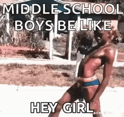 Man In Bikini Standing On Sidewalk GIF