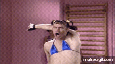 Man In Bikini Top Making Funny Face GIF
