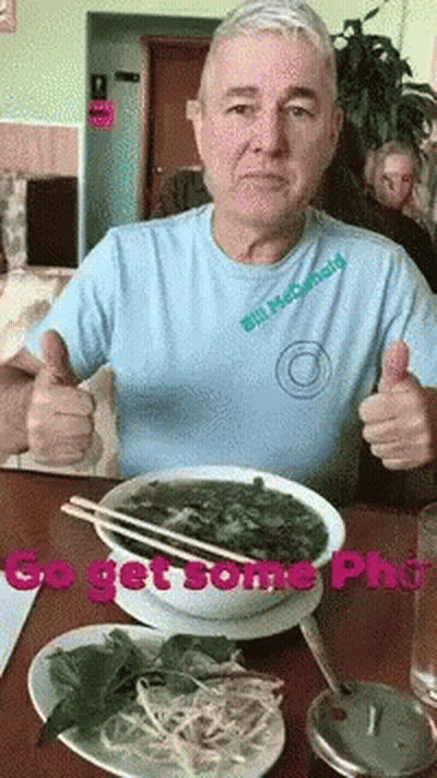 Man In Bill McDonald's Shirt Thumbs Up With Soup GIF