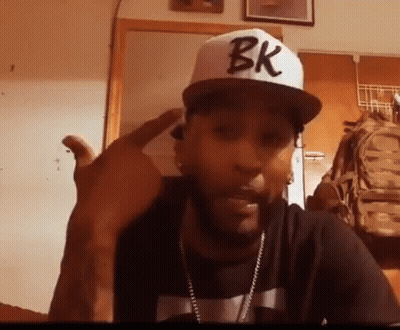 Man In BK Hat And Black Shirt GIF