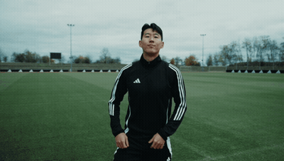 Man In Black Adidas Jacket On Soccer Field GIF