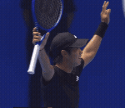 Man In Black Adidas Shirt Playing Tennis GIF