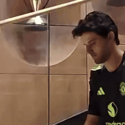 Man In Black Adidas Shirt Standing GIF