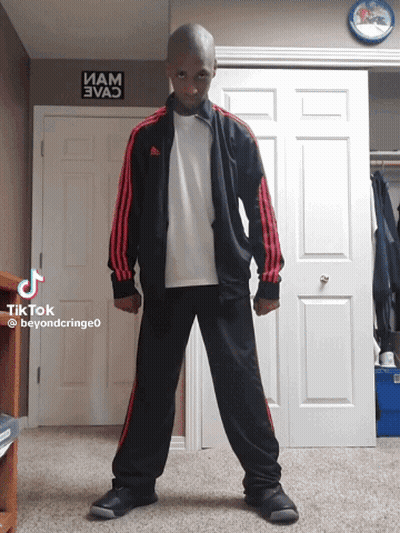 Man In Black And Red Adidas Tracksuit GIF
