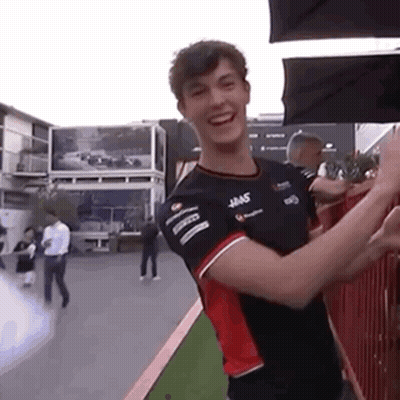 Man In Black And Red Shirt Giving High Five GIF